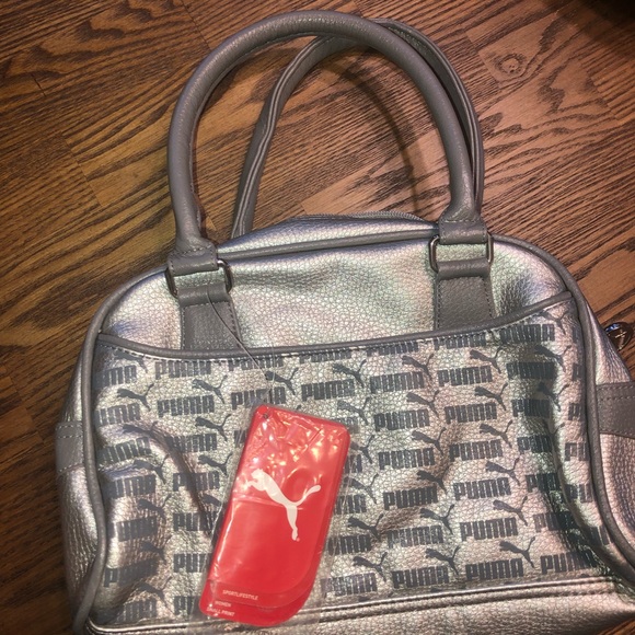 Puma Handbags - Nwt silver puma purse Puma Handbags - Nwt silver puma purse